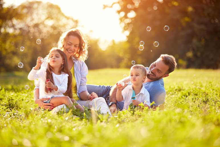 A healthy family enjoying the day in the sun.